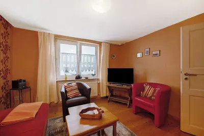 Image de Maison de vacances 'Haus Gertrud' avec vue sur les montagnes, terrasse privée et Wi-Fi