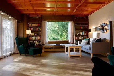 Image de Ferienhaus 09-e mit Kachelofen - Ferienhäuser im Feriendorf Weissensee im Allgäu