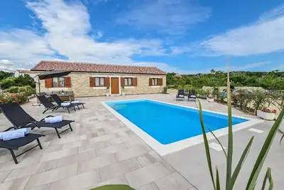 Image de Maison de vacances Novalja pour 1 - 6 personnes avec 2 chambres à coucher - Maison de vacances