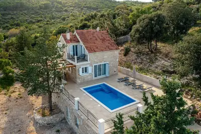 Image de Maison de vacances Povlja pour 1 - 5 personnes avec 2 chambres à coucher - Maison de vacances