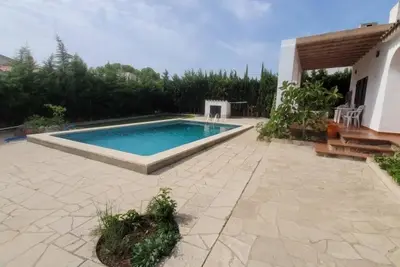 Image de Villa à l'Ametlla de Mar pour 7 pers. avec piscine privée, 3 chambres, jardin et parking.