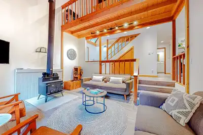 Image de Tranquil forested oasis near rivers and trails with firepit, games, & wood stove