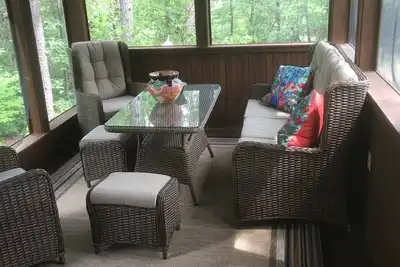 Privacy surrounds this home with a mountain view and lake access.