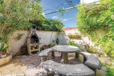 Image de Appartement de deux chambres avec le balcon et la vue sur le mer Barbat, Rab (A-22498-a)