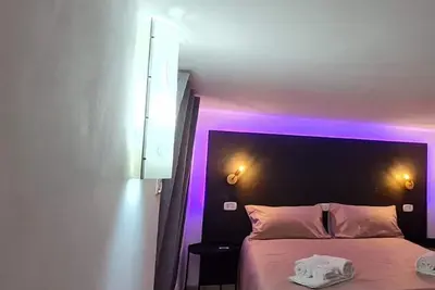 Image de Casa Vacanza in Via Plebiscito, a 7 Minuti dal Duomo e 2, da Porta Garibaldi