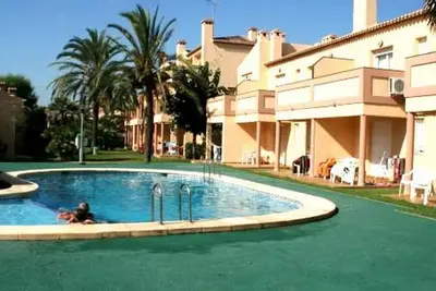 Image de Appartement rénové à Dénia: piscine, jardin, clim, WiFi gratuit, à 500m de la plage