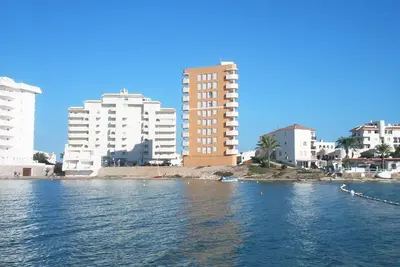 Image de Bel appartement 2 chambres avec piscine, clim et parking à La Manga