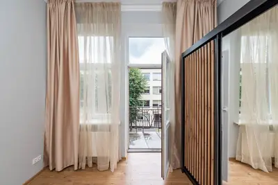 Image de Elegant city center apartment with free parking By Polo Apartments