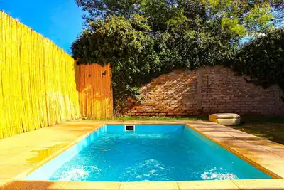 Image de House in Chacras de Coria's heart with Patio, Swimming Pool, Grill, and Garage