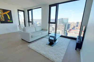 Image de Luxueux condo neuf meublé & équipé. Maestria au coeur du Quartier des Spectacles