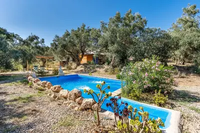 Image de Maison de vacances \"Cabaña Shadú\" avec vue sur les montagnes, piscine partagée et Wi-Fi