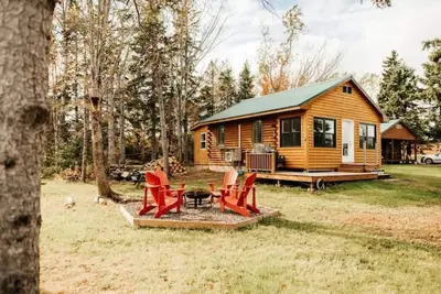 Image de Escape to Tranquility at The Sandy Pearl: A Cozy Log Cottage Retreat