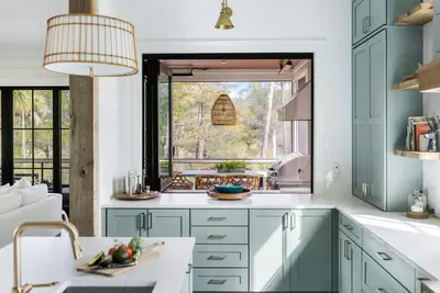 Image de Outdoor game room + fire pit with scenic marsh views