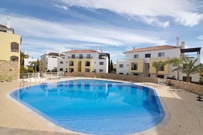 Image de Appartement 'O'Pomar 150' avec piscine partagée, balcon et climatisation