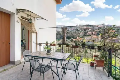 Image de Appartement 'Casa Giordano' avec vue sur les montagnes, terrasse privée et jardin partagé