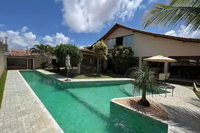 Image de Casa a 90 Metros da Praia / Piscina / Sauna / Churrasqueira / Sinuca / Etc