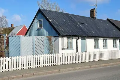 Image de Maison de vacances pour 4 a Tomelilla-By Traum