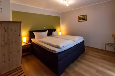 Image de Gemütliche Ferienwohnung Direkt am Rennsteig. Fewo mit Kamin und Terrasse