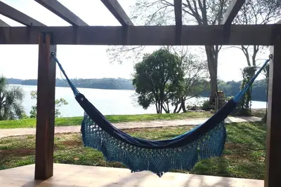 Image de Lindo Chalé com Hidromassagem na Beira do Lago com Vista Para o pôr do sol