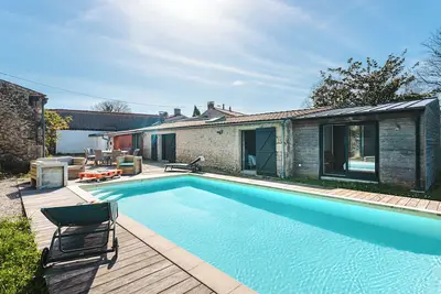 Image de Maison de vacances 'Magnolia' avec piscine privée, terrasse privée et Wi-Fi