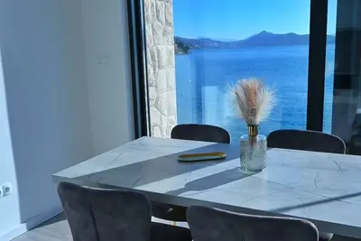 Image de Villa Mangata 101 Apartment. Beachfront apartment for an unforgettable stay!