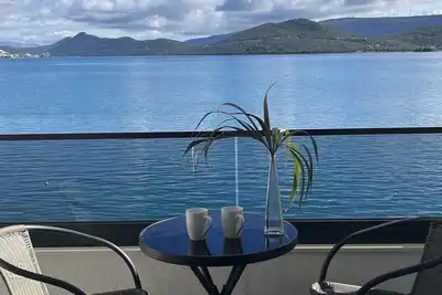 Image de Villa Mangata 102 Apartment. Beachfront apartment for an unforgettable stay!