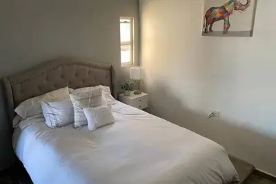 Ocean View- Modern upstairs unit with Patio