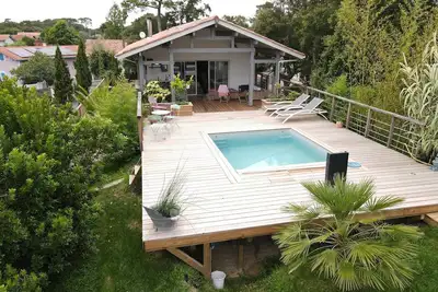 Image de Villa Ohana pour 8 personnes avec piscine et cuisine d'été. Wifi gratuit