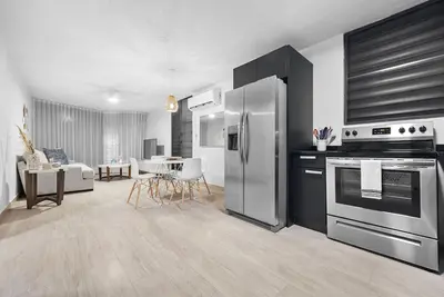 Image de Fully Renovated Coastal Apartment Steps from the Beach with Private Parking