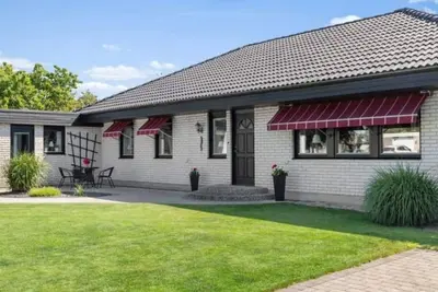 Image de Ferienhaus Kronenpark, Angelcamp mit Angelboot, Kanus, Fahrräder, Jakuzzi uvm