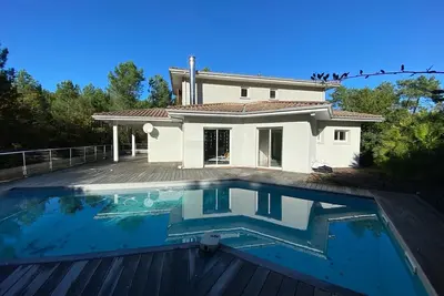 Image de Cap Ferret - Villa standing avec piscine en lisière de forêt, calme absolu
