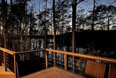 Modern pet friendly home w/ covered dock near Lake Lanier Olympic Park