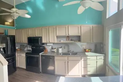 Image de 2 Couple island condo in a Florida nudist resort.