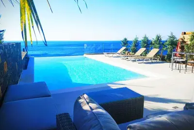 Image de An exquisite and luminous seaside villa. The epitome of coastal serenity.