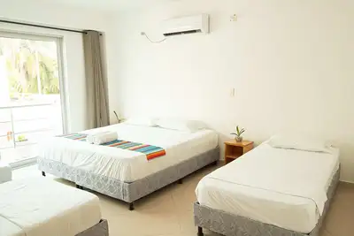 Image de Habitación Superior Familiar Con Balcón Cerca A La Playa