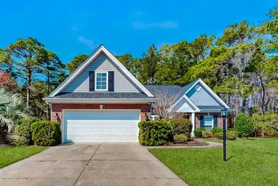 Image de Dog-friendly coastal home with lovely patio, pool, & games - near beaches & golf