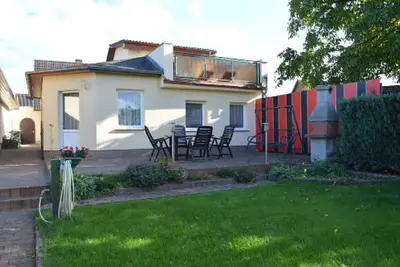 Image de Maison de vacances 'Ferienhaus Müritz - Brockmann' avec terrasse privée, jardin partagé et Wi-Fi