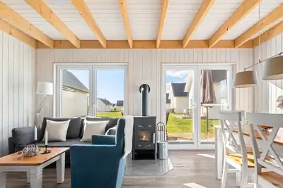 Image de Freistehendes Haus Strandläufer mit Sauna, Kamin und Terrasse