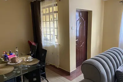 Image de Cozy 2-bedroom apartment with Ac and WiFi in this wonderful home away from home.