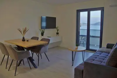 Image de Villa Mangata 104 Apartment. Beachfront apartment for an unforgettable stay!