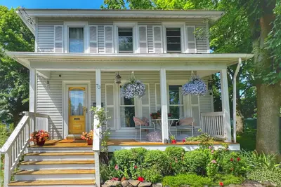 Image de Charming Village Home with an Enchanting Backyard Oasis