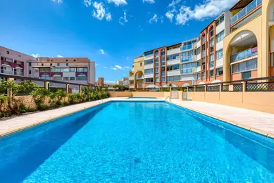 Image de Appartement rez de jardin climatisé avec piscine partagée et climatisation