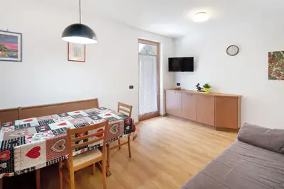 Image de Appartement 'Cesa Portados Stefano 1' avec vue sur les montagnes, jardin partagé et Wi-Fi