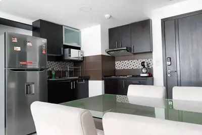 Image de Penthouse de 2 Habitaciones con Vista al rio y Parking