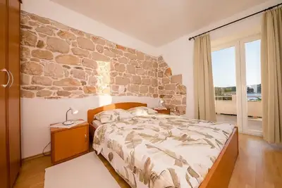 Image de Appartement de deux chambres prés de la plage Barbat, Rab (A-22757-a)