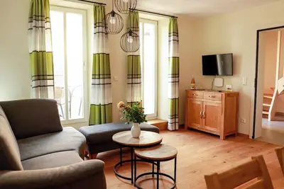Image de Appartement 'Ferienwohnung Kammer' avec terrasse privée, jardin partagé et Wi-Fi