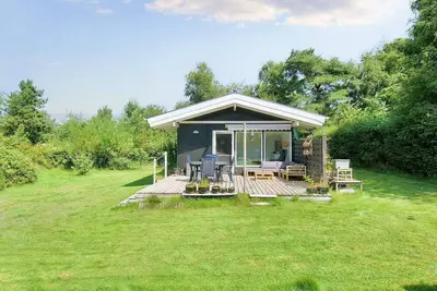 Image de Maison de vacances pour 4 a Græsted-By Traum