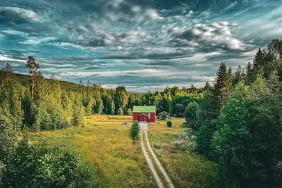 Image de Ferienhaus in Schweden 300m vom See im Wald Alleinlage Hütte in Mittelschweden