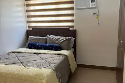 Image de Cozy 1-bedroom condo with Ac and WiFi in enjoyable Quezon City