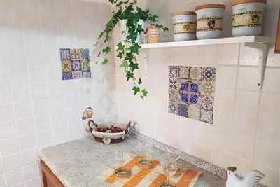 Image de La Tana degli Orsetti Barrea (Aq) (open-air museum) overlooking the lake